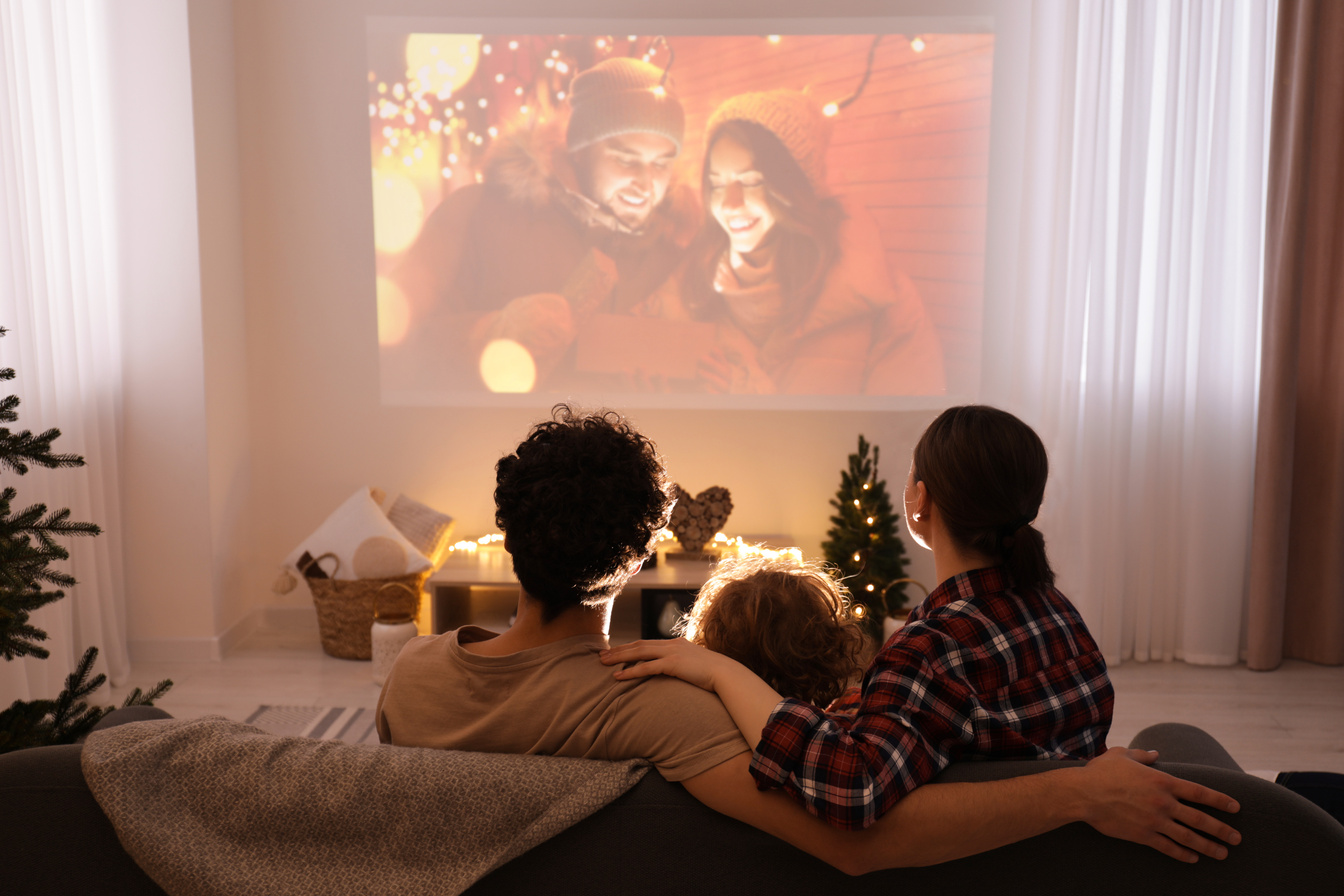 Watching Christmas Movie via Video Projector at Home, Bac